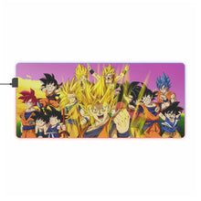 Load image into Gallery viewer, The many forms of Goku throughout the years RGB LED Mouse Pad (Desk Mat)
