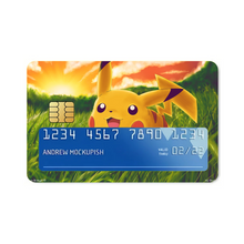 Load image into Gallery viewer, Happy Pikachu in a field of grass Credit Card Skins (4-in-1 Pack)