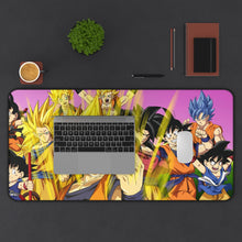 Load image into Gallery viewer, The many forms of Goku throughout the years Mouse Pad (Desk Mat) With Laptop