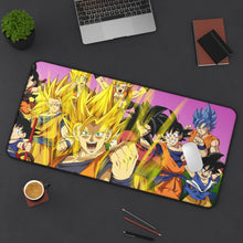 Load image into Gallery viewer, The many forms of Goku throughout the years Mouse Pad (Desk Mat) On Desk
